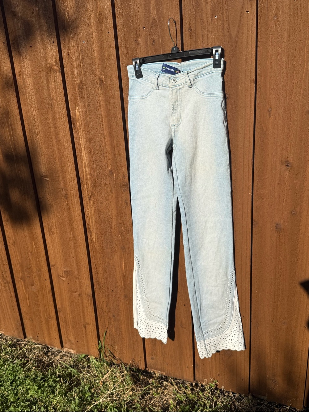 Light Wash Flare Jeans with Crocheted Lace Trim